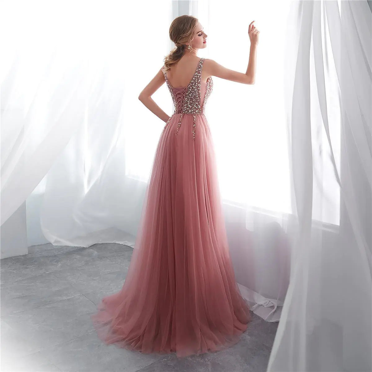 Deep-V Floor-Length Ball Gown with Luminescent Detail