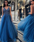 Deep-V Floor-Length Ball Gown with Luminescent Detail