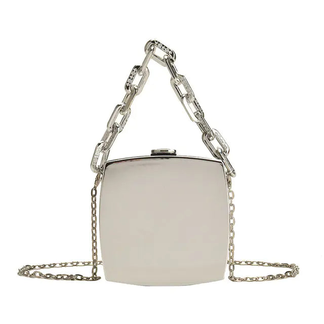 Metal Luxe Box Clutch featuring a thick silver tone chain